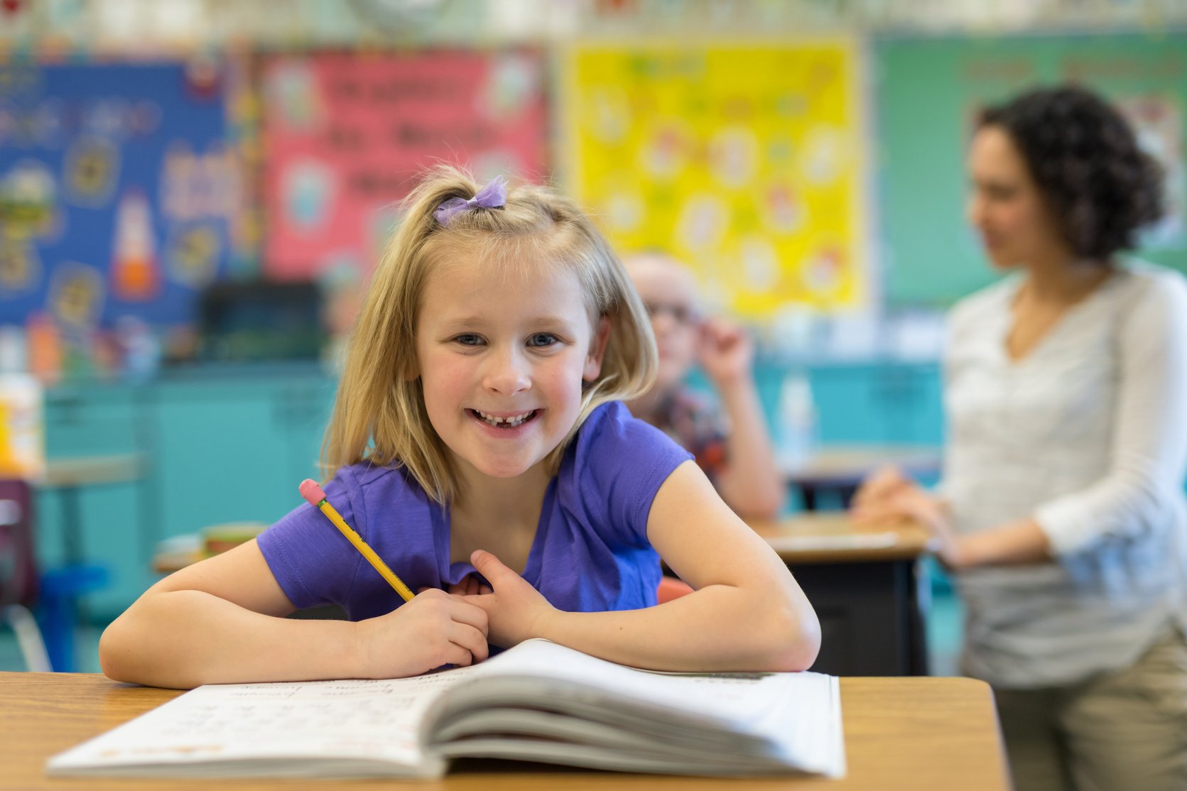 Portrait of a 1st grade girl in the classroom